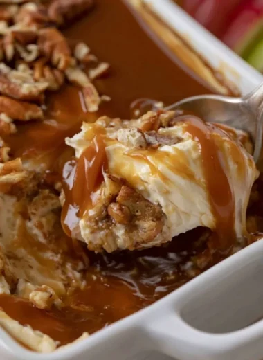 Creamy Caramel Apple Cheesecake Dip served with fresh apple slices