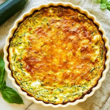 Cottage Cheese Zucchini Quiche served on a plate garnished with herbs