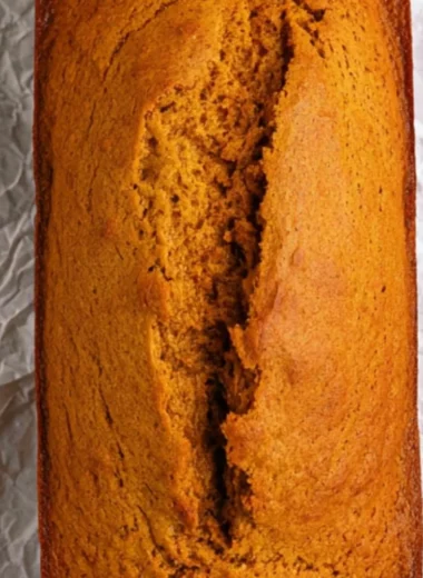 Deliciously moist cake mix pumpkin bread baked with warm spices.