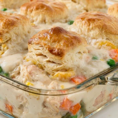 Comforting Chicken Pot Pie Casserole topped with flaky crust