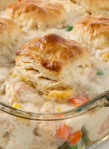 Comforting Chicken Pot Pie Casserole topped with flaky crust