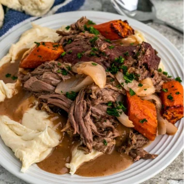 Cozy Crock Pot 3-Packet Pot Roast served with vegetables on a plate