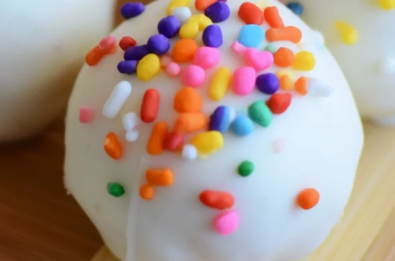 Delicious no-bake cake batter truffles topped with colorful sprinkles