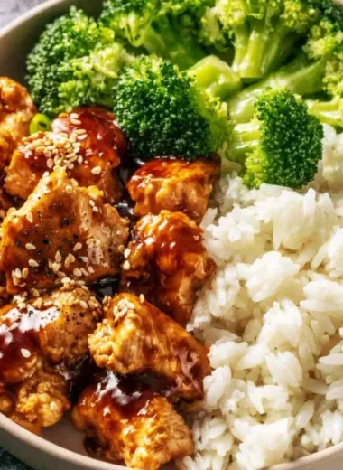 Crockpot Teriyaki Chicken served with rice and vegetables