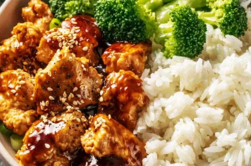 Crockpot Teriyaki Chicken served with rice and vegetables