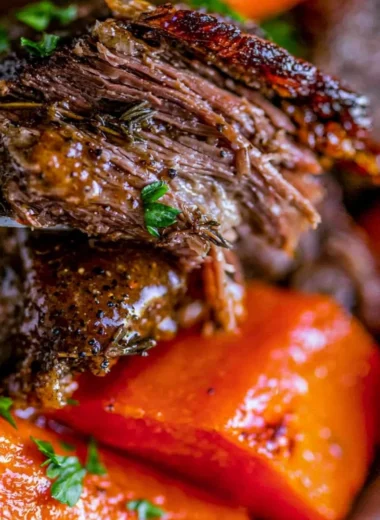 Delicious easy slow cooker pot roast with vegetables in a serving dish.