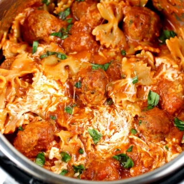 Instant Pot Dump and Go Meatball Lasagna ready to serve with melted cheese