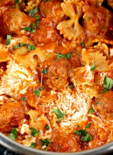 Instant Pot Dump and Go Meatball Lasagna ready to serve with melted cheese