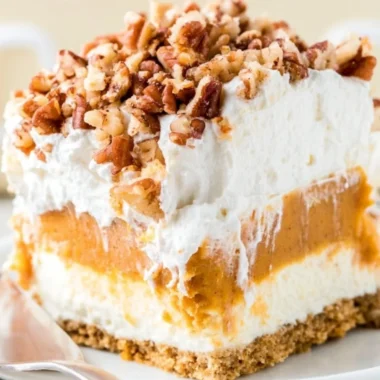 Delicious Pumpkin Lush dessert with creamy layers and autumn spices