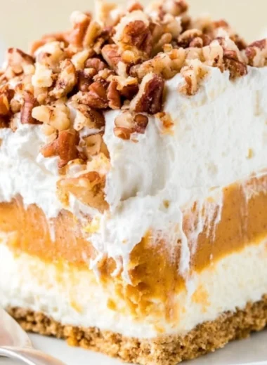 Delicious Pumpkin Lush dessert with creamy layers and autumn spices