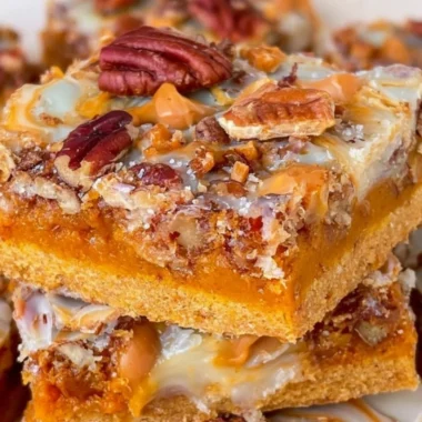 Delicious Pumpkin Magic Bars served on a plate, ideal for fall gatherings