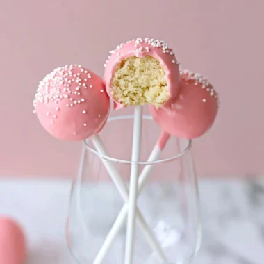 Delicious Starbucks Cake Pop displayed on a wooden table.