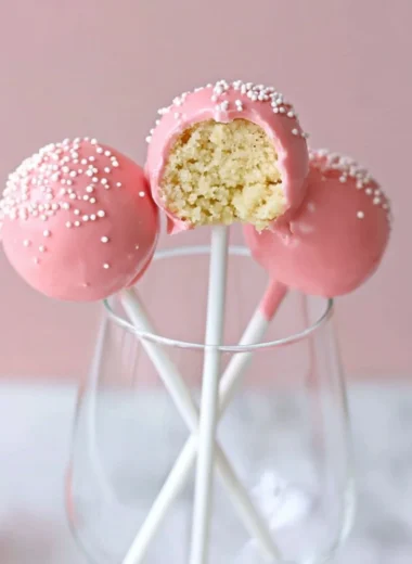 Delicious Starbucks Cake Pop displayed on a wooden table.