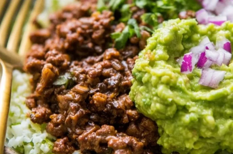 Whole30 Chipotle Beef Bowl with avocado and fresh ingredients