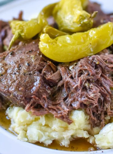 Delicious Whole30 Mississippi Pot Roast served with fresh vegetables