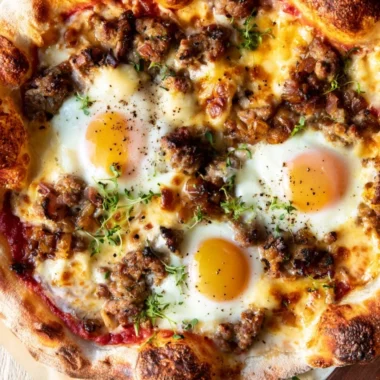 Delicious sausage breakfast pizza served for morning meals