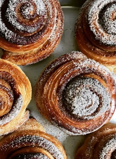 Freshly baked Cardamom Sugar Buns with a sprinkle of sugar.