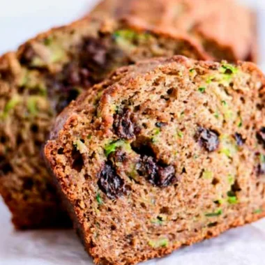 Loaf of homemade chocolate chip zucchini bread with chocolate chips on top