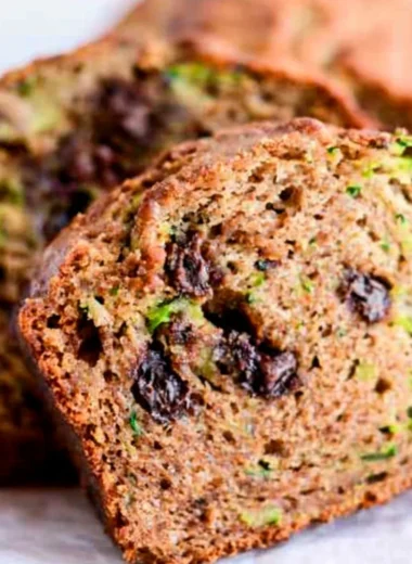 Loaf of homemade chocolate chip zucchini bread with chocolate chips on top