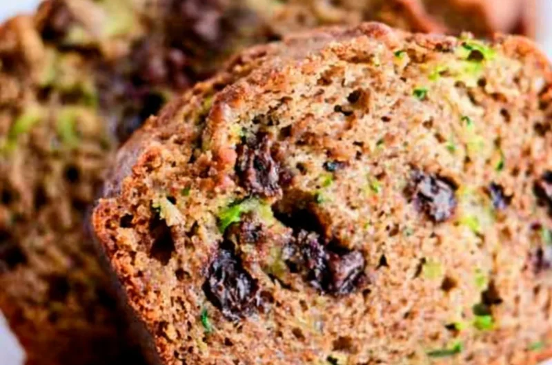 Loaf of homemade chocolate chip zucchini bread with chocolate chips on top