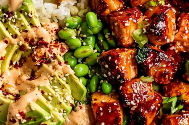 Honey Sriracha Salmon Bowls with fresh vegetables and rice