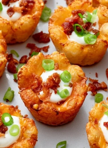 Delicious Loaded Tater Tot Cups topped with savory ingredients