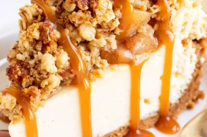 Delicious apple crisp cheesecake with a crunchy topping and creamy texture.