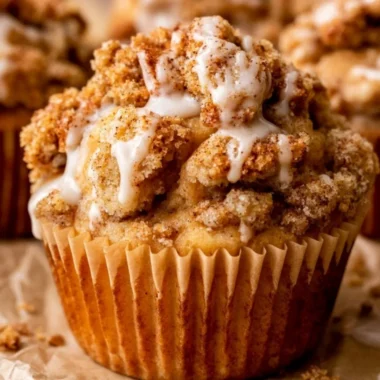 Delicious apple crumble muffins with a crunchy topping fresh out of the oven