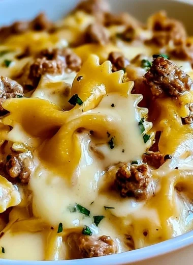 Cozy beef bowtie pasta served with creamy Alfredo sauce