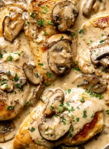 Creamy white wine chicken served with herbs and vegetables