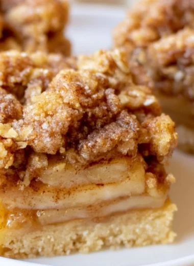 Delicious warm and cozy apple pie bars with cinnamon and a flaky crust