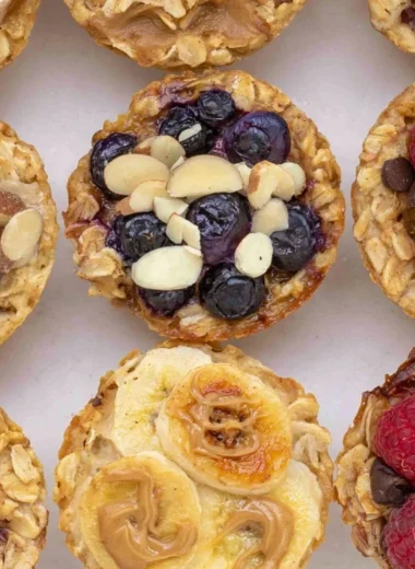 Delicious 4 ingredient baked oatmeal cups served on a wooden table