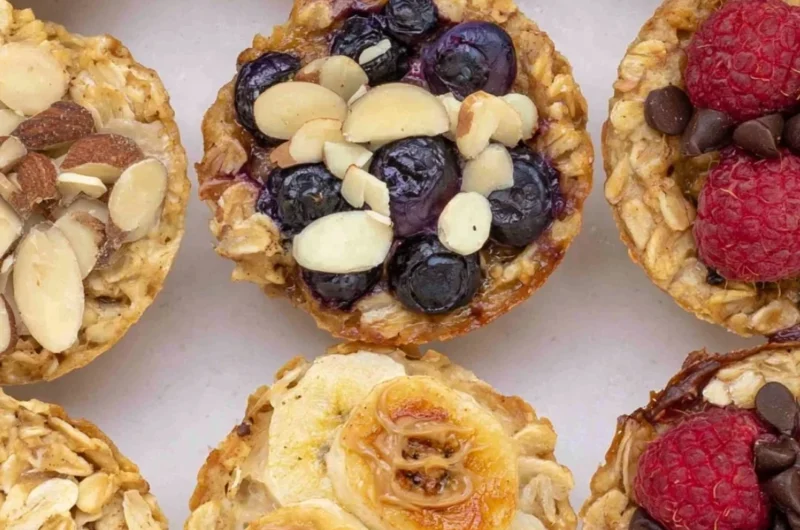 Delicious 4 ingredient baked oatmeal cups served on a wooden table