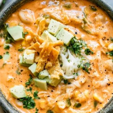 Bowl of award-winning white chicken chili topped with fresh herbs