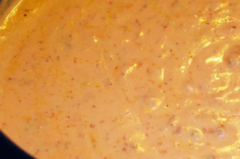 Delicious chorizo cheese dip served in a crockpot, perfect for appetizers.