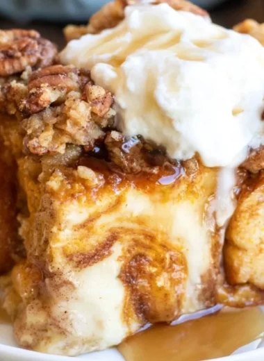 Pumpkin French Toast Casserole baked with spices and served in a cozy dish