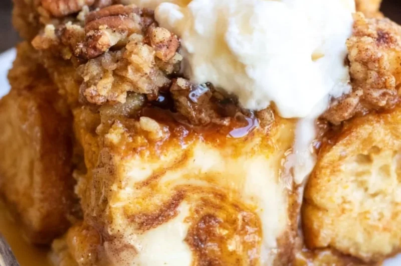 Pumpkin French Toast Casserole baked with spices and served in a cozy dish
