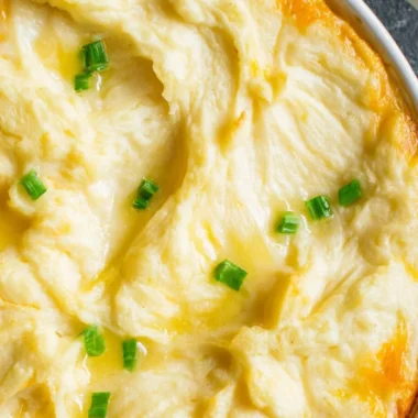 Delicious homemade Shepherd's Pie served in a bowl with a golden crust.