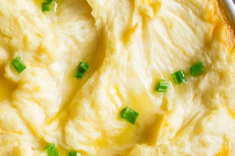 Delicious homemade Shepherd's Pie served in a bowl with a golden crust.
