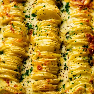 Deliciously creamy and cheesy scalloped potatoes baked to perfection.