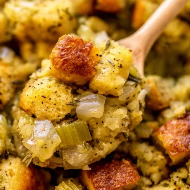 Bowl of classic stuffing with buttery bread cubes and sautéed onions and celery